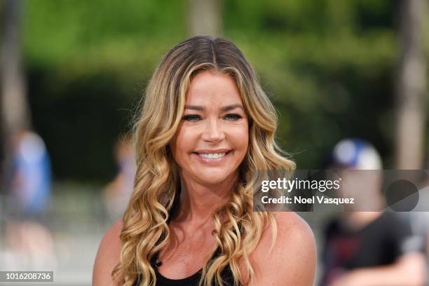 Denise Richards visits "Extra" at Universal Studios Hollywood on August 13, 2018 in Universal City, California.