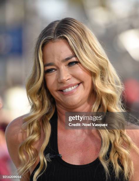 Denise Richards visits "Extra" at Universal Studios Hollywood on August 13, 2018 in Universal City, California.