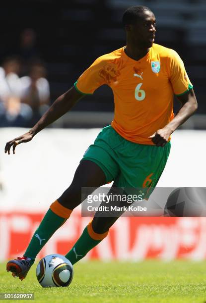 Yaya Toure of Ivory Coast runs the ball during the Japan v Ivory Coast International Friendly match at Stade de Toubillon on June 4, 2010 in Sion,...