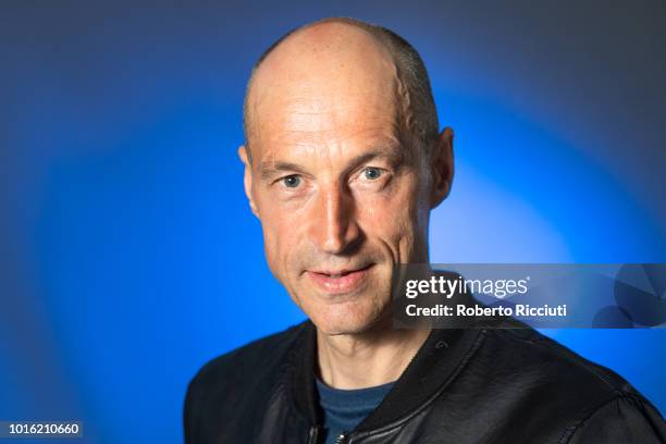 Scottish racing cyclist Graeme Obree attends a photocall during the annual Edinburgh International Book Festival at Charlotte Square Gardens on...