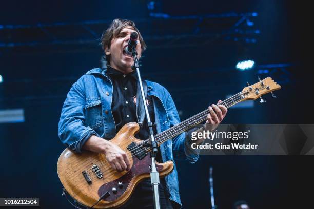 Bass player William Pierce Butler aka William Butler of the Canadian band Arcade Fire performs live on stage during a concert at the Zitadelle...