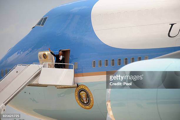 President Barack Obama waves as he boards Air Force One at Andrews Air Force Base on June 4, 2010 in Camp Springs, Maryland. Obama is traveling on...