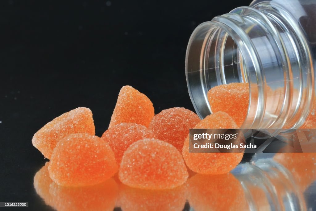 Bottle of orange flavored soft chew gummy vitamins for children