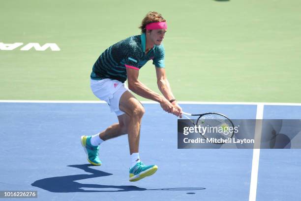 Alexander Zverev of Germany returns a backhand shot to Stefanos Tsitsipas of Greece during a semifinal match on Day Eight of the Citi Open at the...