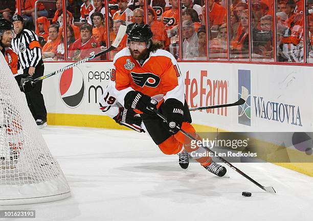 Scott Hartnell of the Philadelphia Flyers skates the puck out from behind his net against the Chicago Blackhawks in Game Three of the 2010 NHL...