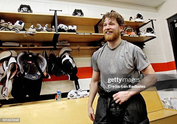 Claude Giroux of the Philadelphia Flyers has time to smile and reflect after scoring the game-winning goal in overtime to defeat the Chicago...