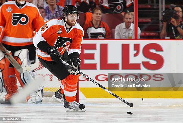 Braydon Coburn of the Philadelphia Flyers skates with the puck against the Chicago Blackhawks in Game Three of the 2010 NHL Stanley Cup Final at the...
