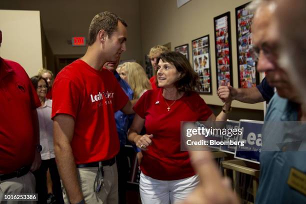 Leah Vukmir, a Republican Senate candidate from Wisconsin, center right, greets attendees during a campaign stop in Elkhorn, Wisconsin, U.S., on...