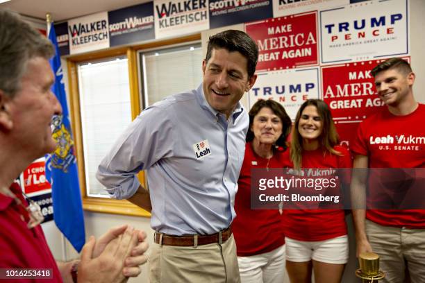 House Speaker Paul Ryan, a Republican from Wisconsin, center left, arrives for a campaign event with Leah Vukmir, a Republican Senate candidate from...