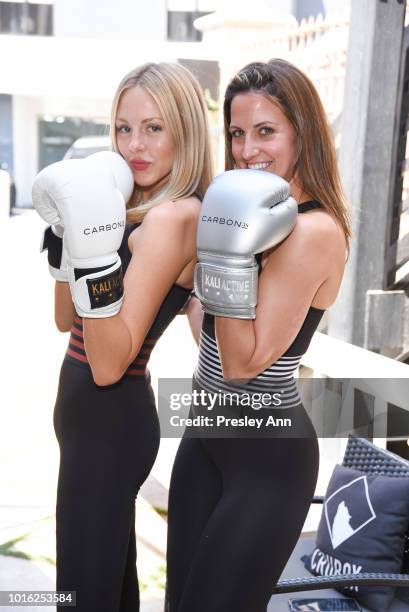 Shea Marie and Katie Warner Johnson attend Carbon38 Celebrates The Launch of SAME Sport X Carbon38 Collection By Shea Marie at CruBox Gym on August...