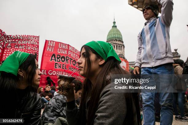 Pro legal abortion activists gather in front of the National Congress Building while senators vote for the new abortion law on August 8, 2018 in...