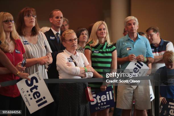 Supporters of Republican congressional candidate Bryan Steil attend a rally with the candidate on August 13, 2018 in Burlington, Wisconsin. Steil is...