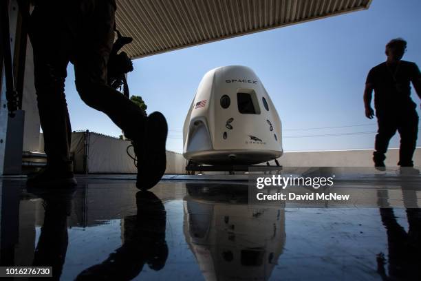 Mock up of the Crew Dragon spacecraft is seen during a media tour of SpaceX headquarters and rocket factory on August 13, 2018 in Hawthorne,...