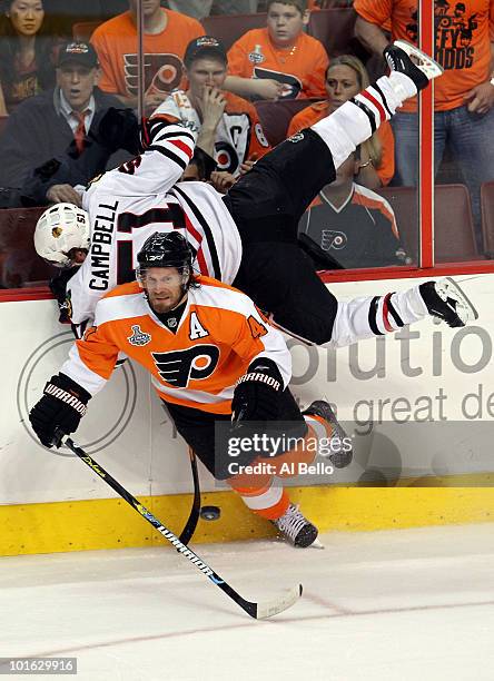 Kimmo Timonen of the Philadelphia Flyers checks Brian Campbell of the Chicago Blackhawks in Game Four of the 2010 NHL Stanley Cup Final at Wachovia...