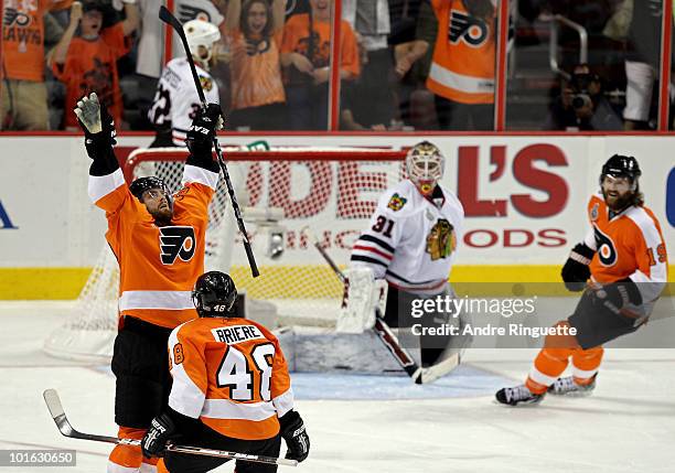 Ville Leino of the Philadelphia Flyers celebrates with teammates after scoring a goal in the third period against Antti Niemi of the Chicago...