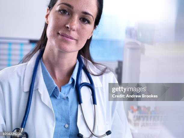 Doctor High Resolution Portrait Of Doctor With Stethoscope Looking At Camera High-Res Stock ...