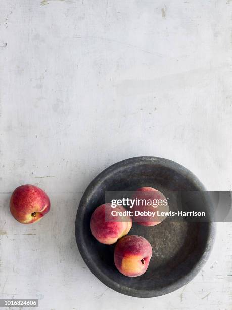 peaches in bowl - peach on white stock pictures, royalty-free photos & images