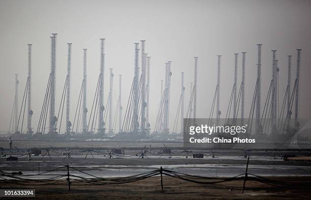 General view of a land reclamation site at the Tanggu Coastal Economic Zone on June 4, 2010 in Tanggu of Tianjin Municipality, China. From 2002 to...