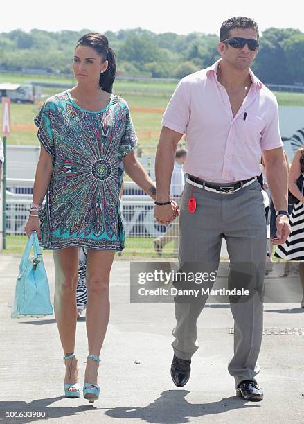 Katie Price aka Jordan and Alex Reid attend the Investec Ladies Day at Epsom Downs on June 4, 2010 in Epsom, England.