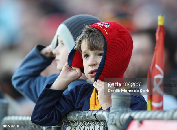 Tense Crows fan watches the game during the round 11 AFL match between the Adelaide Crows and the Fremantle Dockers at AAMI Stadium on June 5, 2010...
