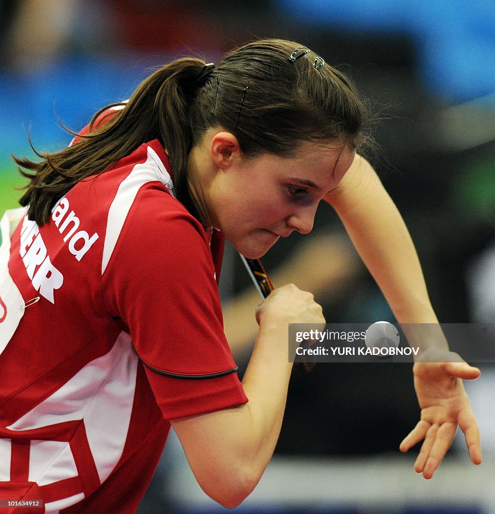Sabine Winter of Germany serves to Beibe