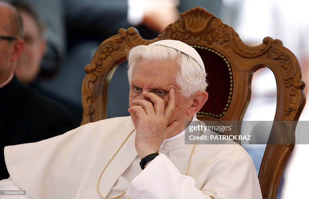 Pope Benedict XVI attends a gathering wi