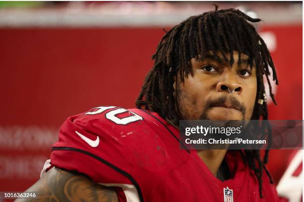 Defensive tackle Robert Nkemdiche of the Arizona Cardinals on the bench during the preseason NFL game against the Los Angeles Chargers at University...