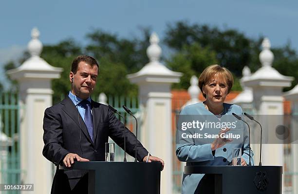 German Chancellor Angela Merkel and Russian President Dmitry Medvedev speak to the media following bilateral talks at Meseberg Palace on June 5, 2010...