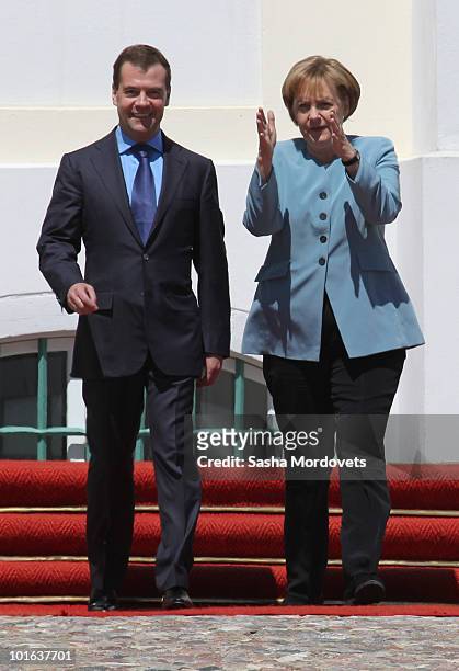 German Chancellor Angela Merkel and Russian President Dmitry Medvedev attend a press conference following bilateral talks at Meseberg Palace on June...