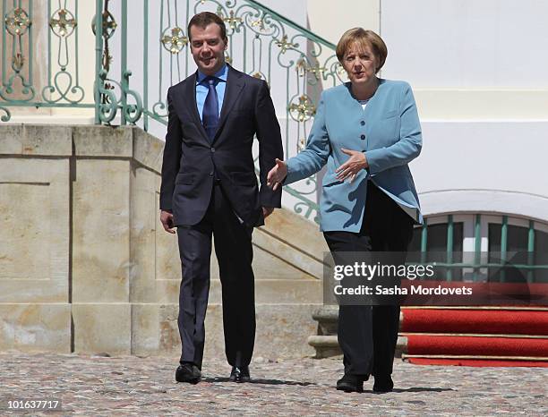 German Chancellor Angela Merkel and Russian President Dmitry Medvedev attend a press conference following bilateral talks at Meseberg Palace on June...