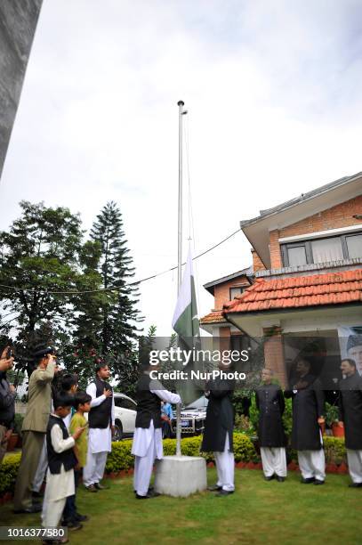 Pakistani Ambassador for Nepal Mazhar Javed hoists the Pakistani national flag during a special programme held on the eve of 71st Independence Day of...