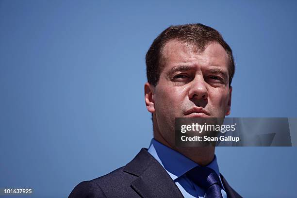 Russian President Dmitry Medvedev speaks to the media with German Chancellor Angela Merkel following bilateral talks at Meseberg Palace on June 5,...