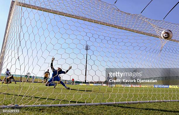 Goalkeeper Mark Schwarzer of Australia fails to stop a goal scored by Edson Buddle of USA during first half of the 2010 FIFA World Cup Pre-Tournament...