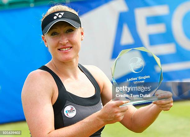 Elena Baltacha of Great Britain poses with the Aegon Trophy after winning the women's singles match between Elena Baltacha of Great Britain and Carly...