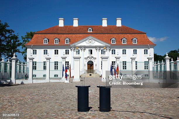 Lecterns stand outside Meseberg Castle ahead of the joint press conference between Angela Merkel, Germany's chancellor, and Dmitry Medvedev, Russia's...