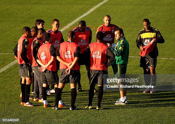 Head Coach Dunga talks with his team during the Brazil training session at Randburg High School on June 5, 2010 in Johannesburg, South Africa. The...