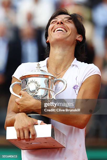 Francesca Schiavone of Italy celebrates with the trophy after winning the women's singles final match between Francesca Schiavone of Italy and...