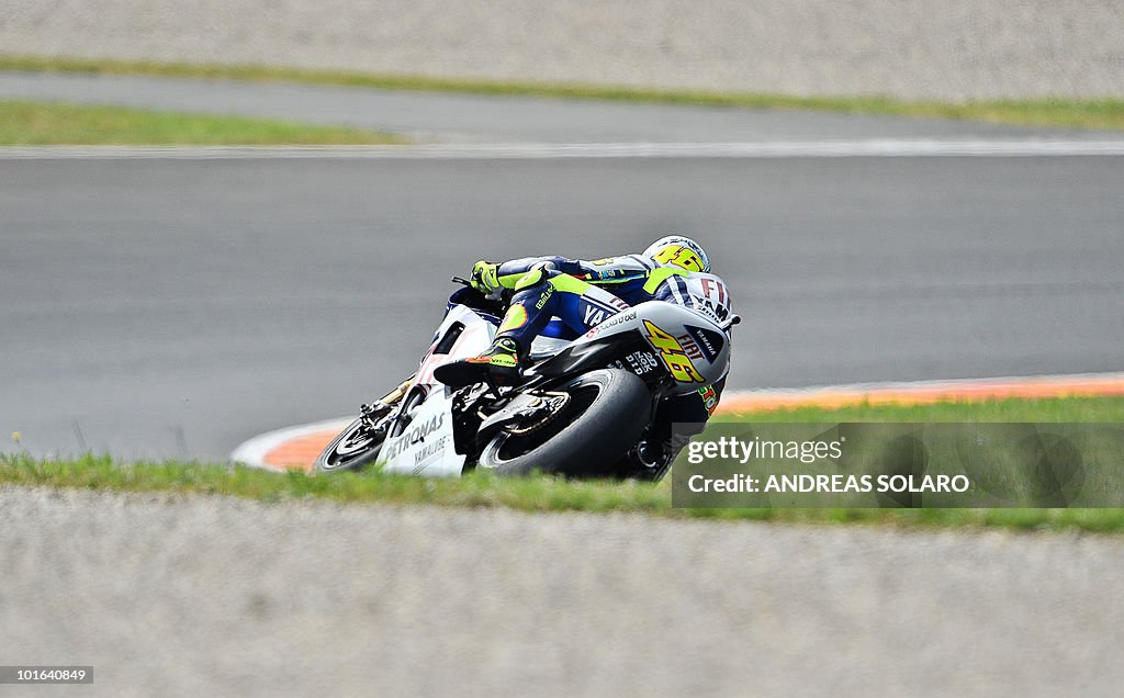 Italy's Valentino Rossi of Yamaha rides