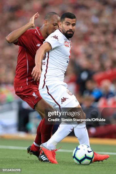 Fabinho of Liverpool battles with Tomas Rincon of Torino during the pre-season friendly match between Liverpool and Torino at Anfield on August 7,...