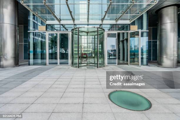 revolving door with empty front space - revolving door ストックフォトと画像