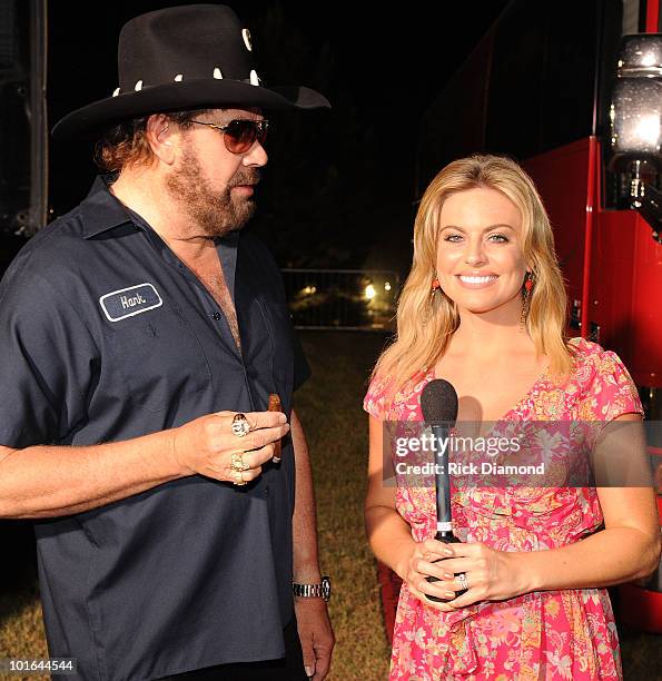 Singer/Songwriter Hank Williams Jr. And FOX National TV Personility Courtney Friel backstage during the 2010 BamaJam Music & Arts Festival at the...