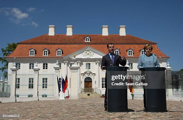 German Chancellor Angela Merkel and Russian President Dmitry Medvedev speak to the media following bilateral talks at Meseberg Palace on June 5, 2010...