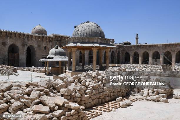 General view shows renovation work at the historic Grand Umayyad mosque in the northern Syrian city of Aleppo on August 14 almost two years after...