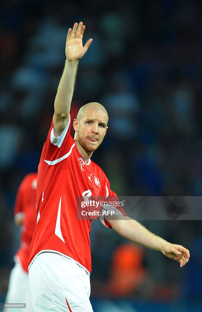 Switzerland's Philippe Senderos waves to