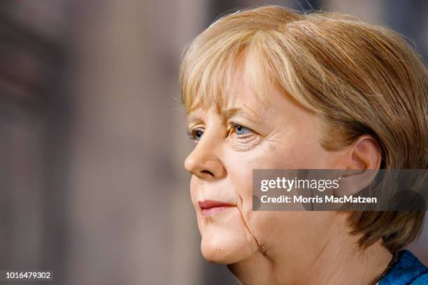 Wax figure of German Chancellor Angela Merkel during its presentation day at Panoptikum on August 14, 2018 in Hamburg, Germany. Panoptikum is...