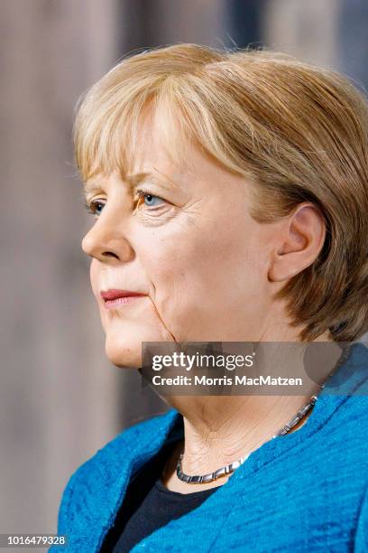 Wax figure of German Chancellor Angela Merkel during its presentation day at Panoptikum on August 14, 2018 in Hamburg, Germany. Panoptikum is...