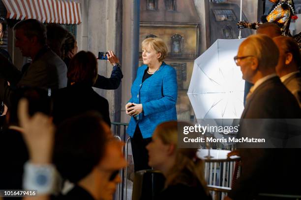 Wax figure of German Chancellor Angela Merkel during its presentation day at Panoptikum on August 14, 2018 in Hamburg, Germany. Panoptikum is...