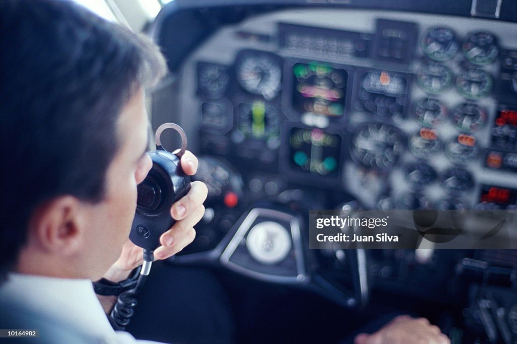 AIRPLANE PILOT TALKING ON RADIO