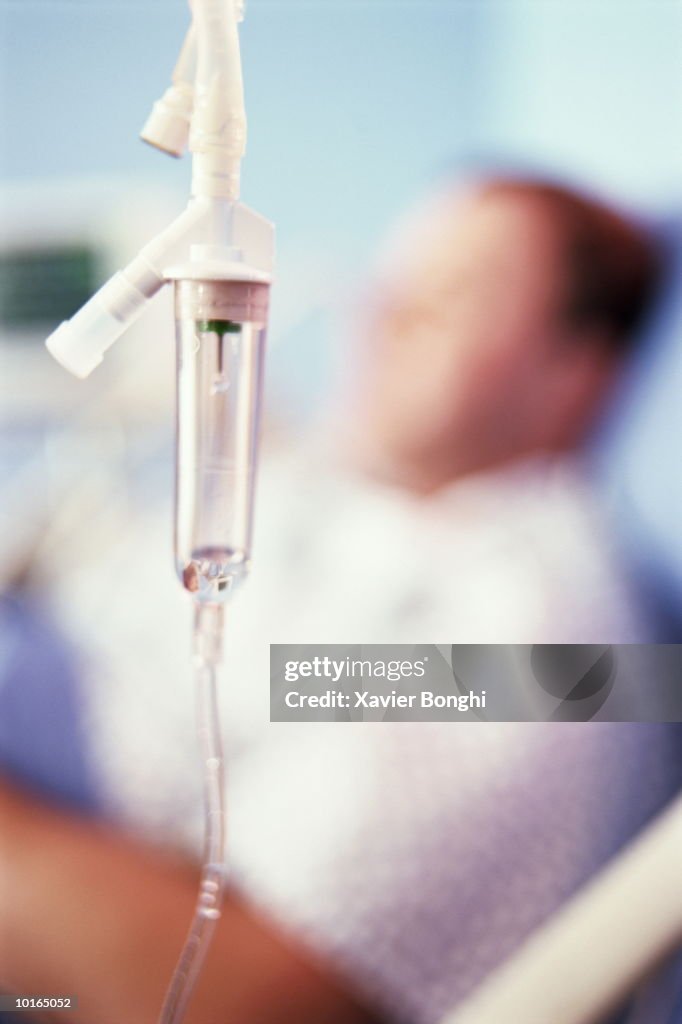 IV DRIP, MAN IN HOSPITAL BED