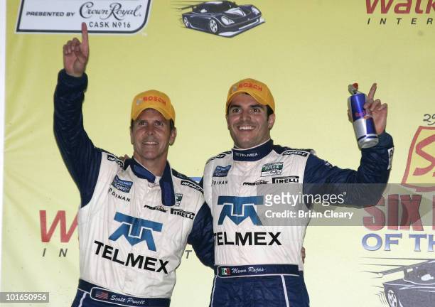 Scott Pruett, L, and Memo Rojas celebrate after winning the Sahlen's Six Hours of the Glen at Watkins Glen International Raceway on June 5, 2010 in...
